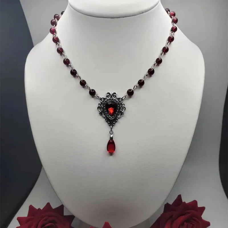 The Neo-Gothic Garnet Droplet | Sculpted Deep-Red Gemstone & Noir Filigree Necklace | Gothica 2026 Boutique Exclusive | Parisian Princess