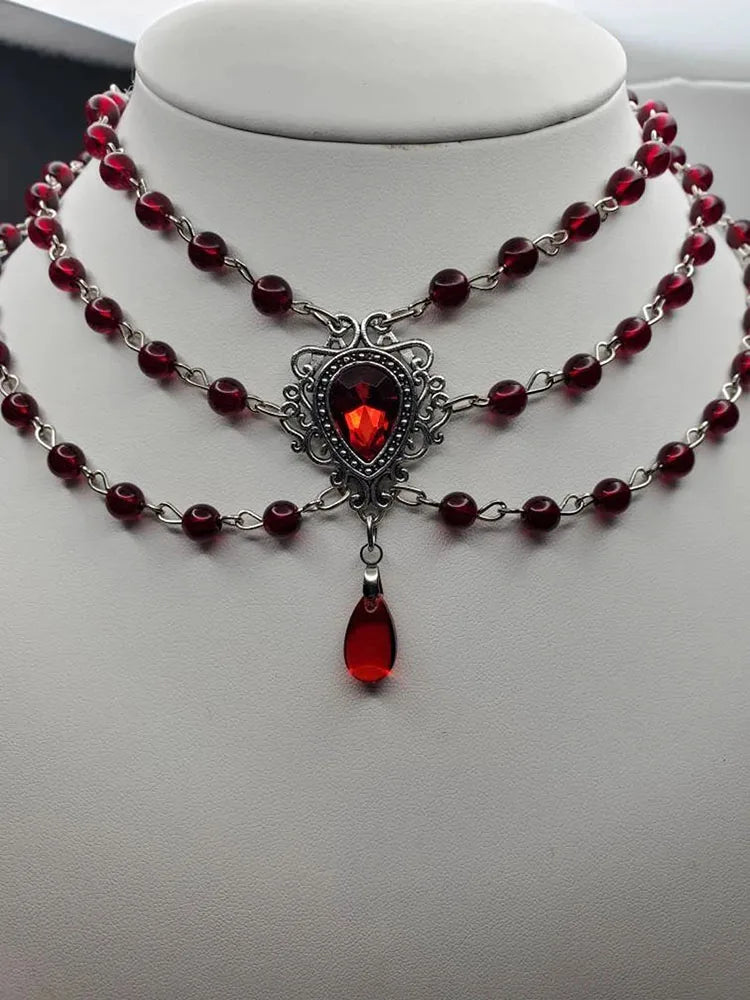 The Neo-Gothic Garnet Droplet | Sculpted Deep-Red Gemstone & Noir Filigree Necklace | Gothica 2026 Boutique Exclusive | Parisian Princess