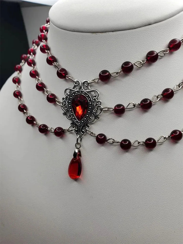 The Neo-Gothic Garnet Droplet | Sculpted Deep-Red Gemstone & Noir Filigree Necklace | Gothica 2026 Boutique Exclusive | Parisian Princess