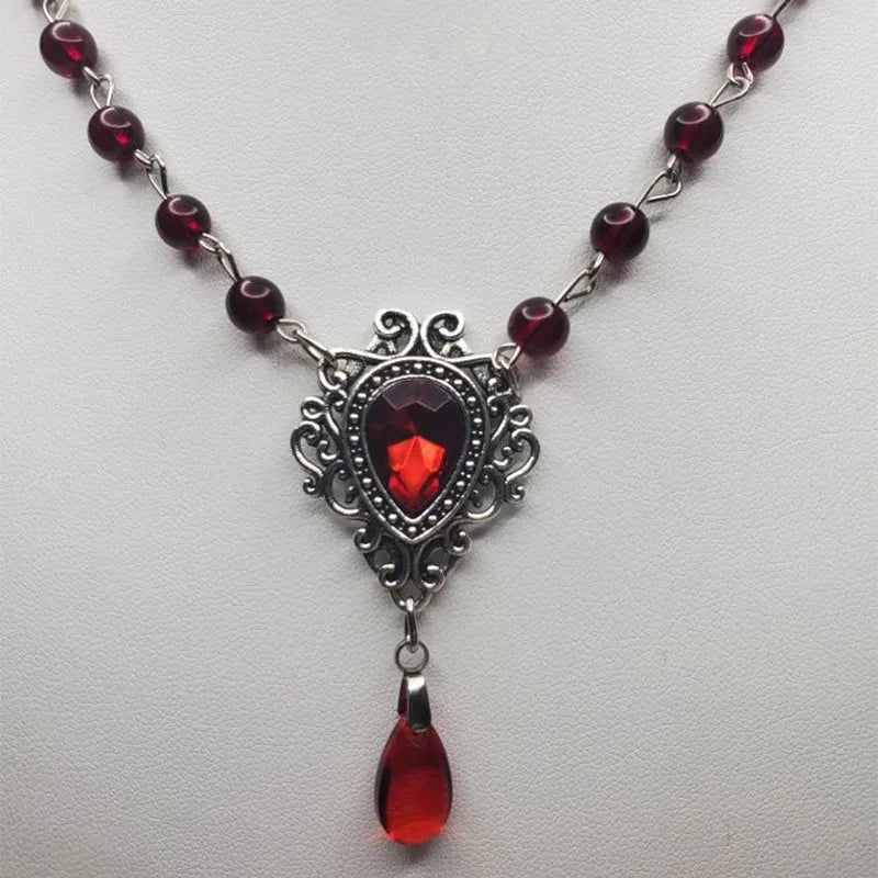The Neo-Gothic Garnet Droplet | Sculpted Deep-Red Gemstone & Noir Filigree Necklace | Gothica 2026 Boutique Exclusive | Parisian Princess